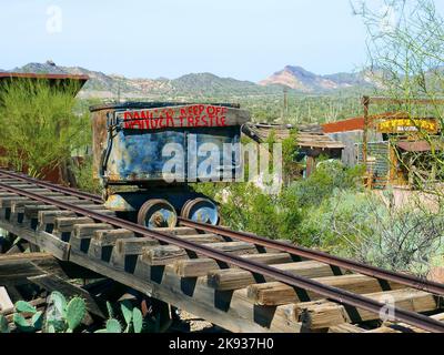 GOLDFIELD GHOST TOWN, USA -  MARCH 3, 2011: mining equipment in Goldfield Ghost town, USA. Back in 1he 1890s Goldfield boasted 3 saloons, boarding hou Stock Photo