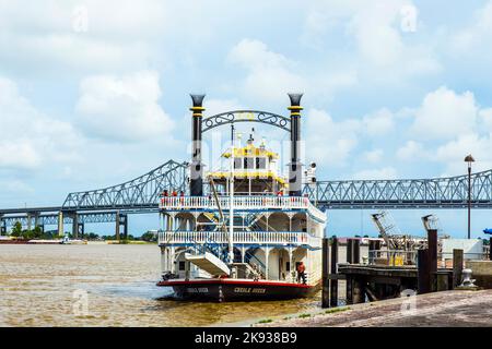 NEW ORLEANS - JULY 16, 2013: people at the creole Queen steam boat in New Orleans, USA. Constructed in Moss Point, Mississippi, the Creole Queen took Stock Photo