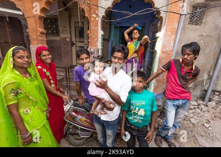 JODPUR, INDIA - OCTOBER 23, 2012: indian family poses proudly in Jodhpur, India. Jodhpur is the second largest city in the Indian state of Rajasthan w Stock Photo