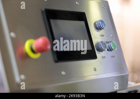 Control panel of modern food production machine. Selective focus. Stock Photo