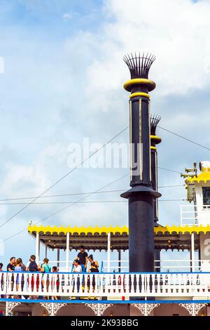 NEW ORLEANS - JULY 16, 2013: people at the creole Queen steam boat in New Orleans, USA. Constructed in Moss Point, Mississippi, the Creole Queen took Stock Photo