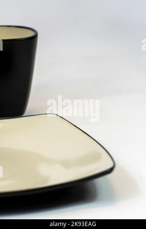 empty cup and saucer on white background for text space or copy space Stock Photo