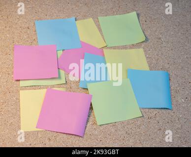 Empty colorful notes on cork board background Stock Photo