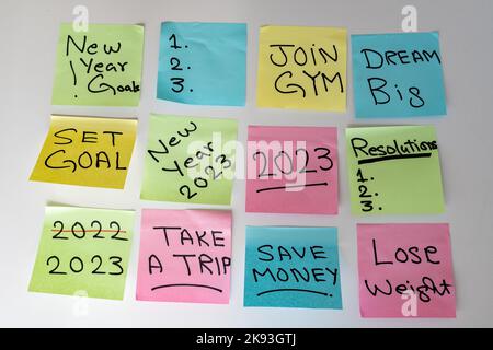 New Year 2023 goals hand written on a sticky notes on a white isolated background Stock Photo