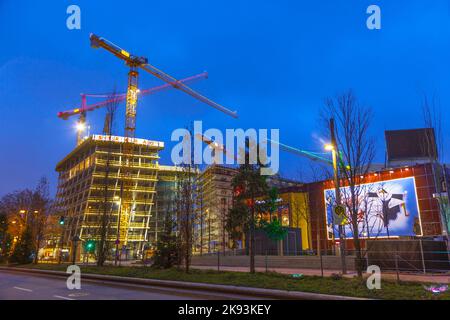 HAMBURG, GERMANY - JANUARY 20: at the construction site at the Reeperbahn in Hamburg they work 24 hours daily to finalize the new skyscraper on Jan 20 Stock Photo