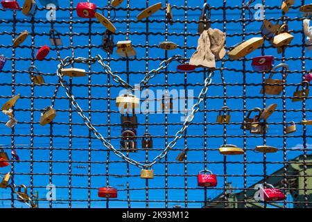 COLOGNE, GERMANY - MAY 11. lockers at the  Hohenzollern bridge symbolize love for ever on May 11,2011 in Cologne, Germany. It is the most heavily used