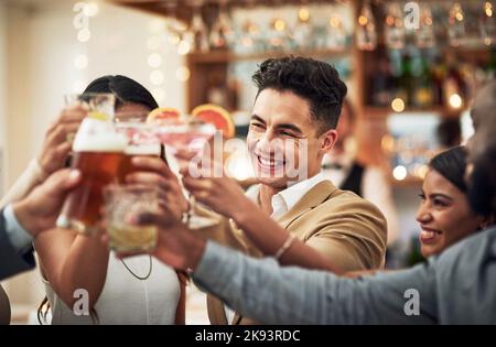 Female friends making celebratory toast Stock Photo - Alamy