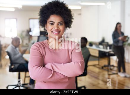 Take your place in the front. Portrait of a confident young businesswoman working in a modern office. Stock Photo