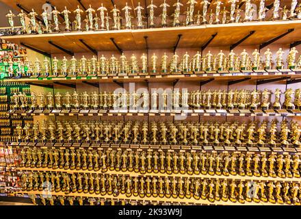 LOS ANGELES - JUNE 26: Oscar statues offered in shops inHollywood on June 26,2012 in Los Angeles. The first Academy Awards ceremony was held on May 16 Stock Photo