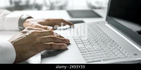 business person hands typing on laptop computer in bright modern office. banner with copy space Stock Photo