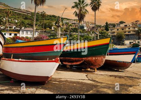 colorful fishing boats at fisherman village Camara de Lobos in Madeira island Stock Photo
