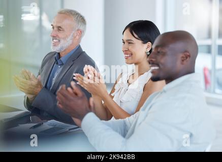 Business, presentation and success celebration of a corporate team clapping in a meeting. Business meeting, teamwork and target goal completion of a Stock Photo