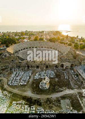 ancient city of Side, Turkey. The largest amphitheater in Turkey. The main street of the ancient city and Mediterranean Sea. View from above. High quality photo Stock Photo