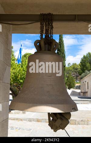 Bronce bells hangs in front of the Moni Thari monastery. The monastery is one of the most important religious monuments on the island of Rhodes. Stock Photo