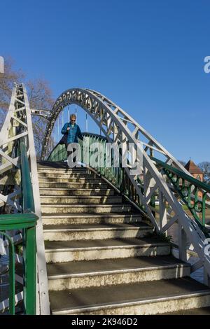 The suspension footbridge, Bedford, UK; built in 1888 to join the Embankment Gardens with Mill Meadows on the other side of the River Great Ouse Stock Photo