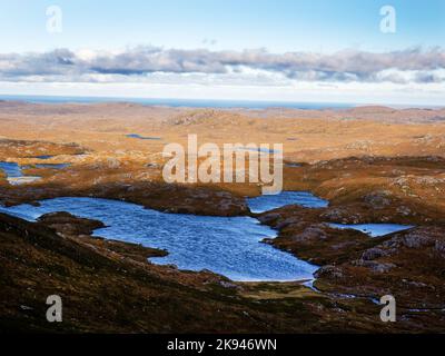 Looking over the Glen Canisp forest from Suilven, Assynt, Scotland, UK. Stock Photo