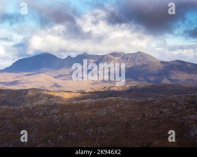 Looking over the Glen Canisp forest to Quinag from Suilven, Assynt, Scotland, UK. Stock Photo