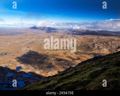 Looking over the Glen Canisp forest to Quinag from Suilven, Assynt, Scotland, UK. Stock Photo