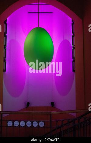 The effect of colourful lighting on a reflective surface This display was Photographed at the Great Hall Market, Budapest, Hungary Stock Photo