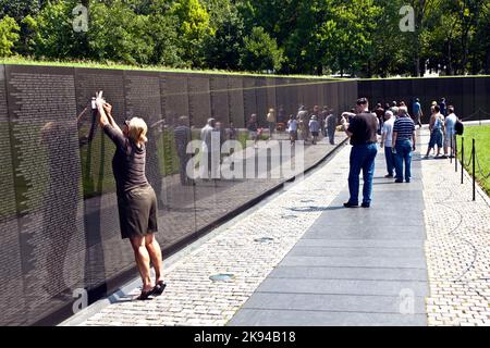 Washington, USA - July 15, 2010: Names of Vietnam war casualties on Vietnam War Veterans Memorial in Washington DC, USA. Names in chronological order, Stock Photo