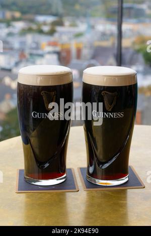 Ireland Eire Dublin St James's Gate Guinness Storehouse beer stout porter black ale started 1759 panoramic view from 7th floor bar 2 pints Guinness Stock Photo
