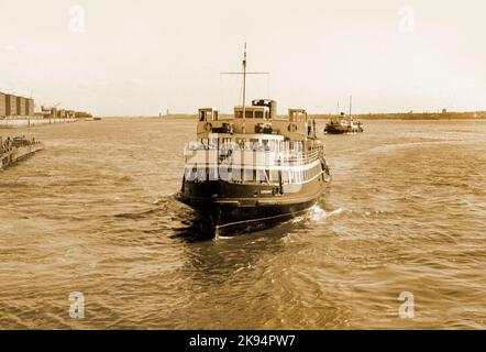 Vintage Liverpool 1968, two ferry boats one is the Egremont ferry setting sail across the river Mersey. Sepia image, Coarse grain effect. Stock Photo