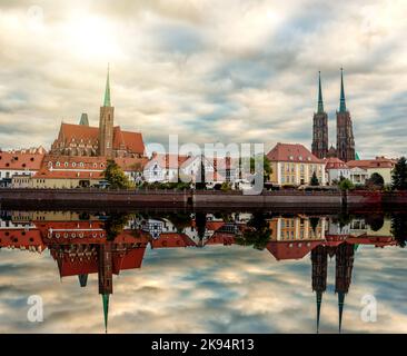 Wroclaw Poland view at Tumski island and Cathedral of St John the Baptist with bridge through river Odra. Stock Photo