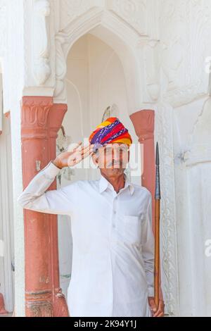 Pushkar, India - October 20, 2012: Indian welcome from a doorman with turban in a hotel in Pushkar, India. Turbans known as Pagadis in local language Stock Photo