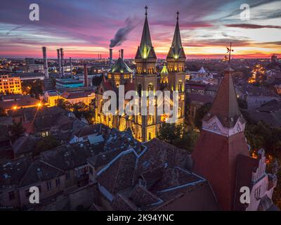Aerial view of a Neo-Romanesque Catholic Church, called Millennium seen at dusk. Photo taken on the 5th of October in Timisoara, Timis County, Romania Stock Photo