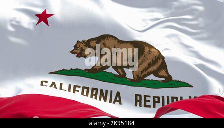 Close-up view of the California State flag waving in the wind. California is a federated state of the US located in the South West Coast. Fabric textu Stock Photo