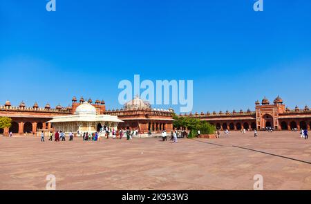 Fatephur Sikri, India - November 17, 2011: Pilgrims visit the Jama Masjid Mosque in Fatehpur Sikri, India. The mosque was constructed by Mughal empero Stock Photo