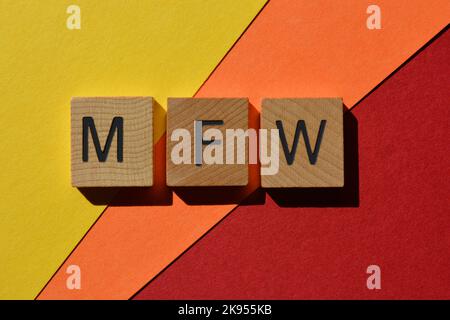 MFW, abbreviation for My Face When used in text speak, in wooden alphabet letters isolated on colourful background Stock Photo