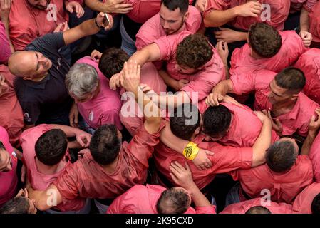 People of Colla Vella dels Xiquets de Valls celebrating after completing a 'castell' (a human tower) in the 2022 Santa Úrsula Festival (Catalonia) Stock Photo