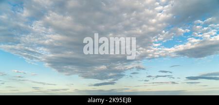 Beautiful sunset sky with some clouds during summer on a nice day Stock Photo