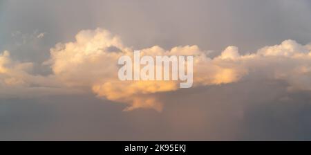 Beautiful sunset sky with some clouds during summer on a nice day Stock Photo
