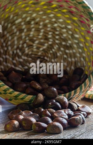 chestnuts in the overturned basket Stock Photo