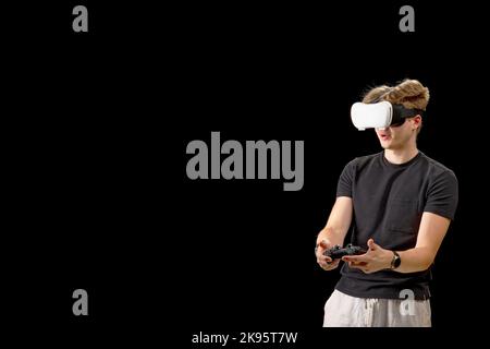 Portrait of a young man with 3D virtual reality glasses. Young man using vr headset, VR goggles Stock Photo