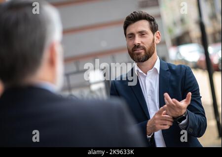 Two business partners having negotiations Stock Photo