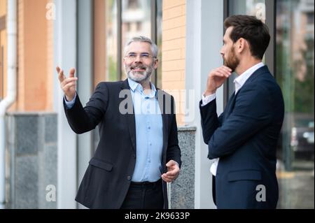 Two business partners having negotiations Stock Photo