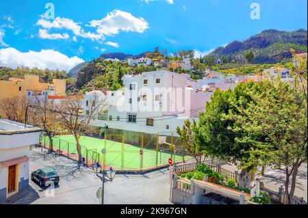 Scenic view of street with typical white houses in San Bartolome de Tirajana mountain village. Gran Canaria. Canary islands, Spain Stock Photo