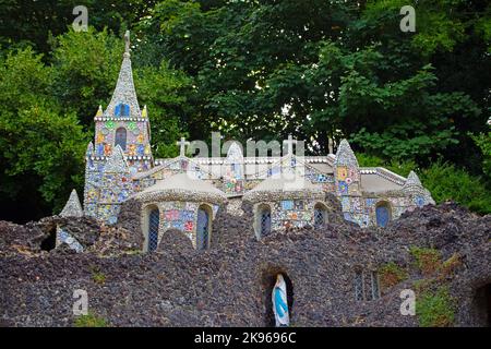 The colourful Little Chapel at Les Vauxbelets, Guernsey, is one of the smallest chapels in the world. It measures 16ft x 9ft. It is made from broken p Stock Photo