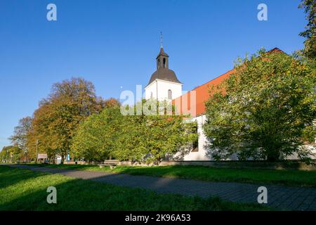 Duisburg - View to the village church which is the oldest church in Friemersheim and evangelical since 1560, protetected by the dike, North Rhine West Stock Photo