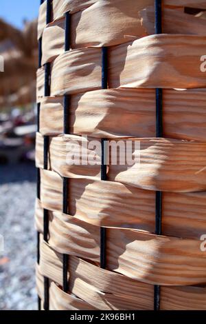 Flower pod decorated by wood veneer. A full frame brown wood veneer surface. Wood veneer texture backlight close up Stock Photo