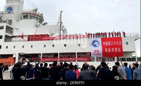 (221026) -- SHANGHAI, Oct. 26, 2022 (Xinhua) -- Chinese researchers wave goodbye as the research icebreaker Xuelong 2, or Snow Dragon 2, sets off for the country's 39th Antarctic expedition from Shanghai, east China, Oct. 26, 2022. A total of 255 researchers will carry out investigations in the fields of atmospheric composition, water environment, sedimentary environment and ecosystem at the South Pole, and will arrive in two batches, with the second batch setting out on Oct. 31, 2022. The expedition team is expected to return to China in early April next year. (Polar Research Institute of Stock Photo