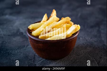 Bowl filled with french fries Stock Photo