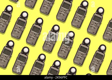 top view of a professional lightmeter on a colourful background, repetition, pattern, pop, professional studio shot Stock Photo