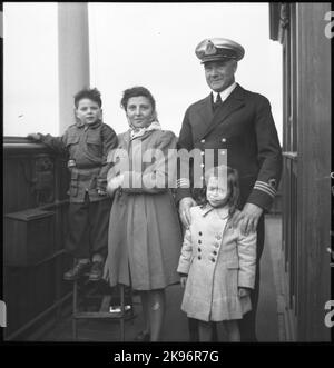 Captain on the train ferry Malmö together with Danish refugees, on their way home to Denmark. Stock Photo