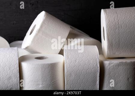 photo white toilet paper on a black background Stock Photo