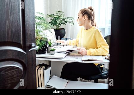 Student Employment Job Search. Young Student woman browsing work opportunities online using job search web sites and applications in home Stock Photo