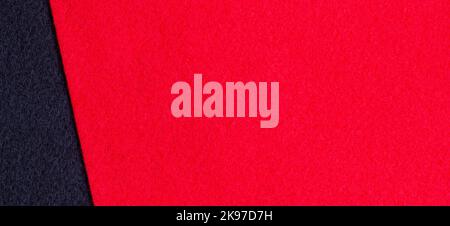 Red and black color felt textile fabric texture background. Top view Stock Photo